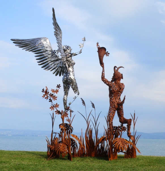 Pan and Syrinx statues rusty